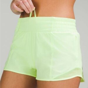 Lightly worn Lululemon neon yellow hotty hot 2.5” shorts in size 2